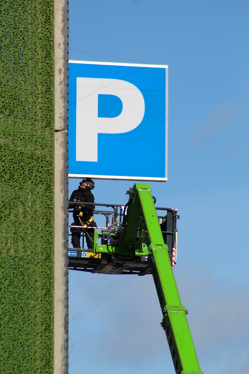 a person on a green tractor